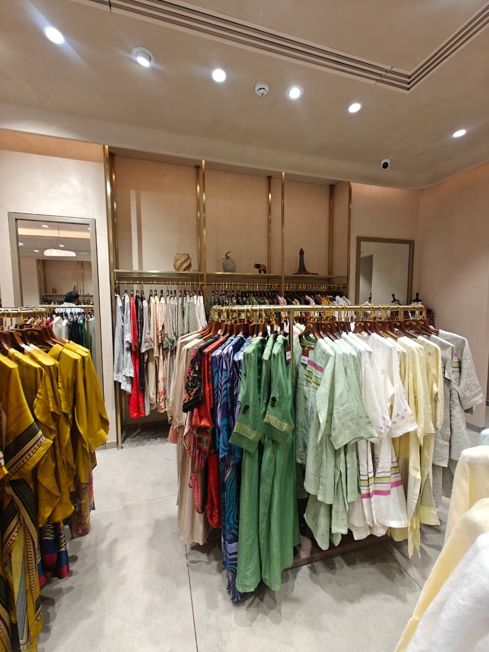 Aanjana Arts apparel racking boutique