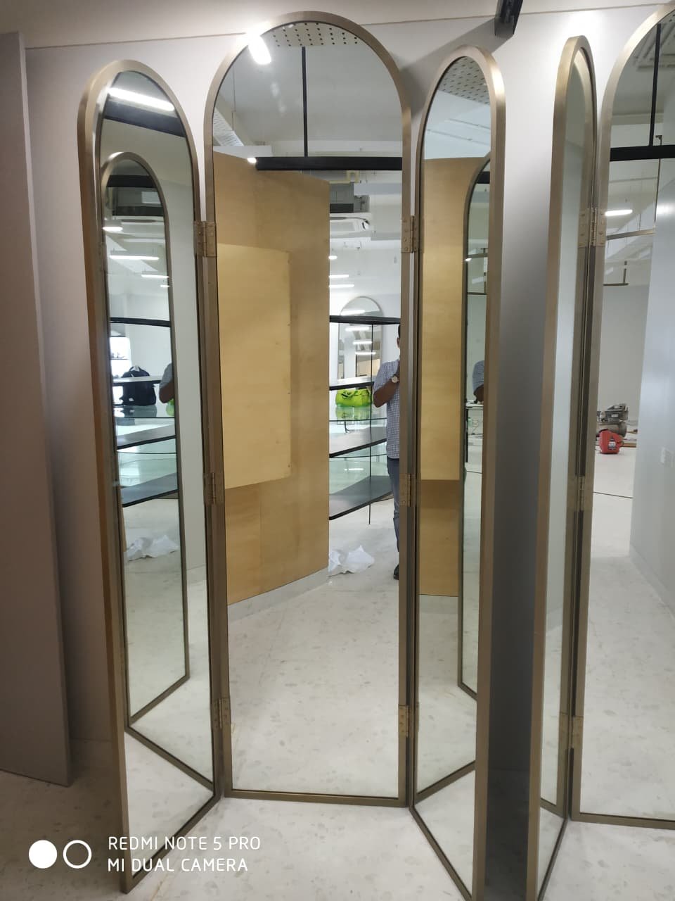 Aanjana Arts arched mirror fitting area